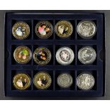 GOLD AND SILVER COIN COLLECTION housed in presentation box. Includes 7 gold-plated 2007 Cook Island