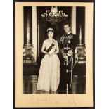 QUEEN ELIZABETH II AND PRINCE PHILIP AUTOGRAPHS a fine 1961 photo of the couple mounted on card,