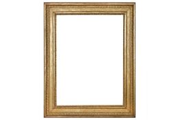 A FRENCH NEOCLASSICAL 19TH CENTURY CARVED OAK AND GILDED FRAME