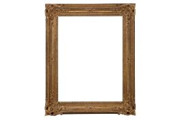 A FRENCH 17TH CENTURY STYLE LOUIS XIV CARVED GILDED LIMEWOOD FRAME