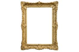 A FRENCH 19TH CENTURY RÉGENCE STYLE CARVED, GILDED AND COMPOSITION FRAME