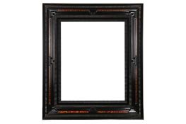A NORTH ITALIAN 17TH CENTURY STYLE POLISHED PEARWOOD COMBINATION PROFILE FRAME WITH RIPPLE AND FAUX
