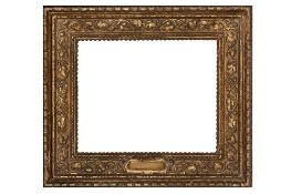 AN ITALIANATE STYLE CARVED AND GILDED CASSETTA FRAME