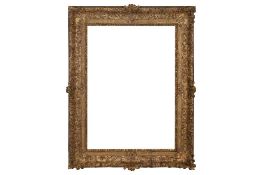 A IMPRESSIVE FRENCH LATE 17TH CENTURY FULLY CARVED AND GILDED OAK LOUIS XIV FRAME