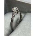 18ct WHITE GOLD DIAMOND SOLITAIRE WITH DIAMOND SHOULDERS