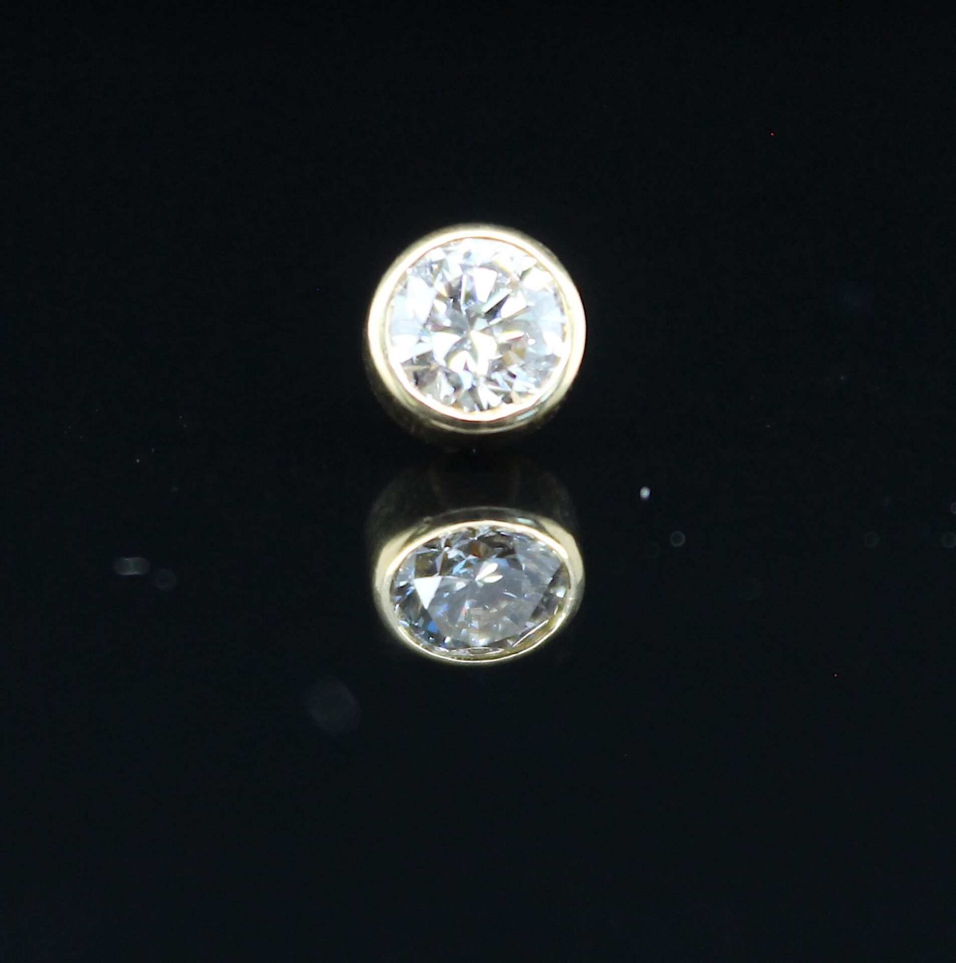 Rever plug with ca. 0.35 ct brilliant