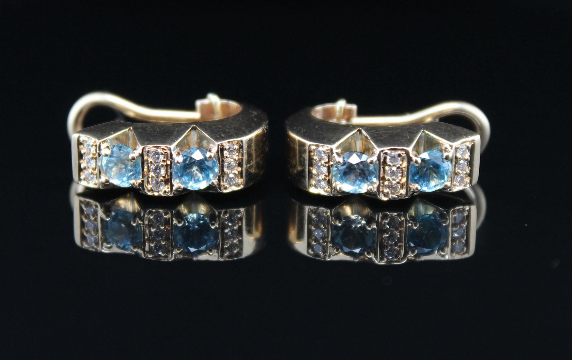 Christ earrings with topaz and brilliants