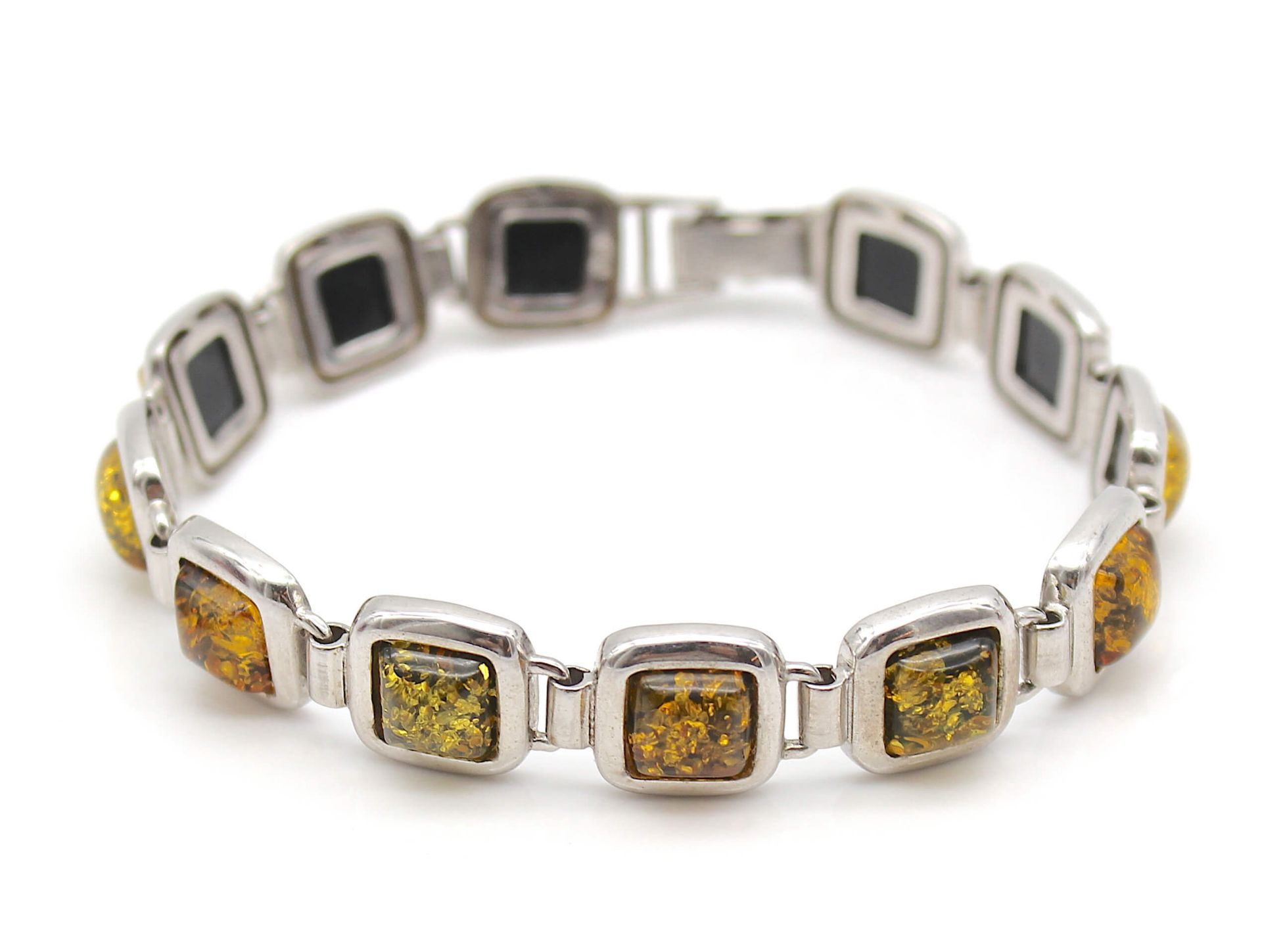 Silver bracelet with amber stones