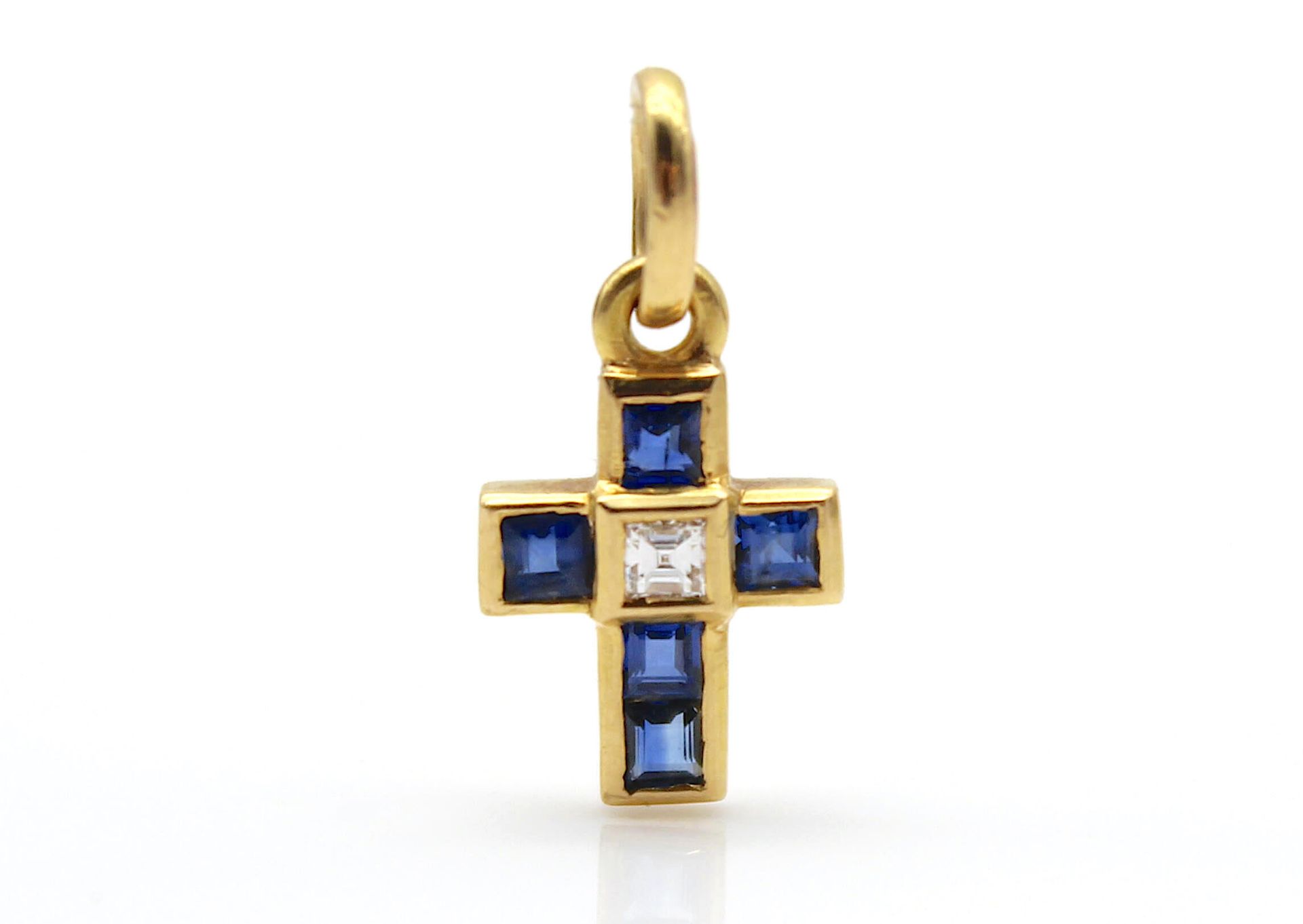 Cross pendant with diamond and sapphires