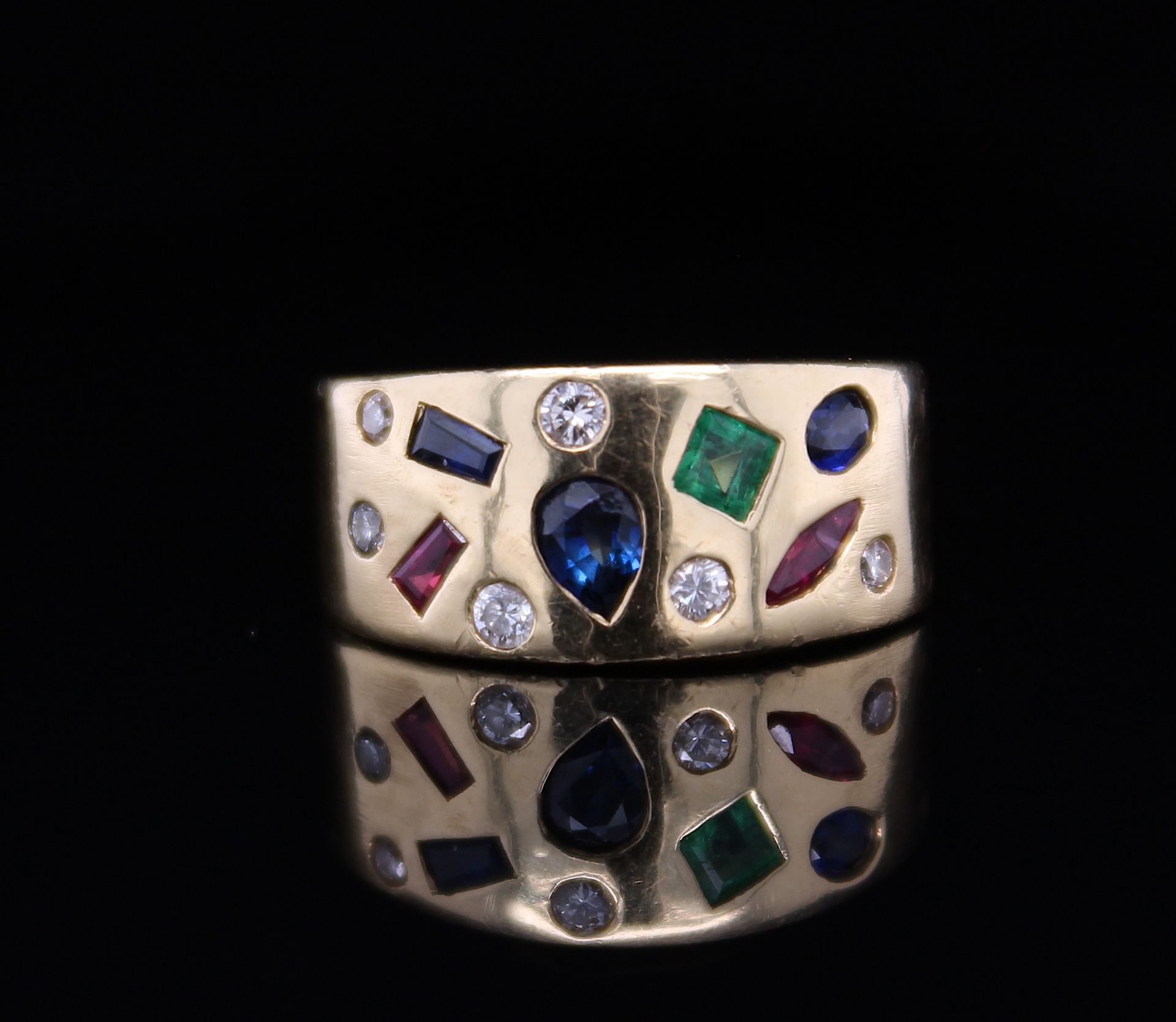 Ring with sapphires, rubies, emerald and brilliants