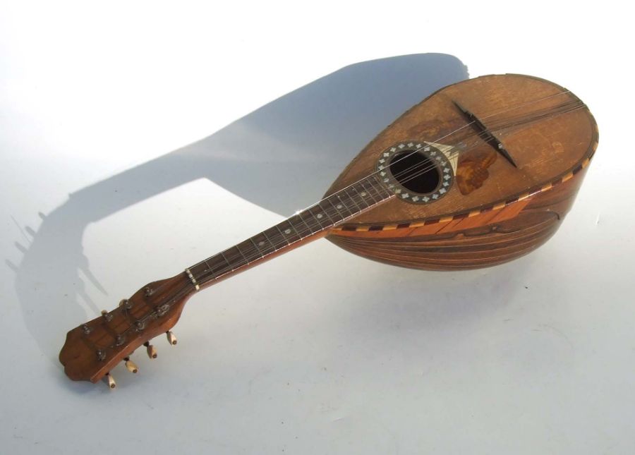 An Italian rosewood mandolin, bears paper label - Il Globo - 60cms long