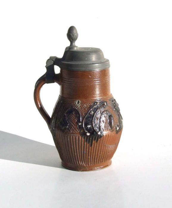 A 19th century German Muskau Bierkrug stein, 20cms high.