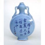 A Chinese moon flask decorated with flowers and calligraphy, blue seal mark to the underside,