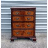 A Georgian style mahogany hi-fi cabinet with four graduated faux drawers, on bracket feet, 59cms