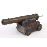 An unusual mid 20th century petrol lighter in the form of an 18th century Blomefield cannon, with