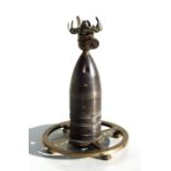 An unusual trench art oil lamp made from an inert WW1 artillery shell. Overall height 15cms (6ins)