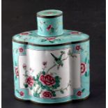 A large Chinese Canton enamel tea caddy of lobed form decorated with panels of birds and prunus