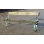 A wrought iron and slatted wood garden bench, 184cms wide.