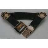 A 19th century silver mounted leather sectional dog collar with indistinct London hallmarks and