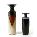 A Graham Newing Studio pottery bottle vase, 31cms high; together with a similar Studio pottery vase,