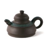 A Chinese Yixing teapot with rams head finial spout,