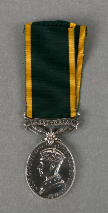 A George VI Territorial Efficiency Service medal awarded to '870241 GMR R Gone RA'.