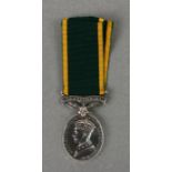A George VI Territorial Efficiency Service medal awarded to '870241 GMR R Gone RA'.
