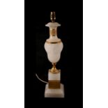 An alabaster and gilt metal table lamp, 45cms high.