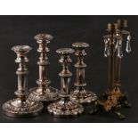 Two pairs of silver plated telescopic candlesticks, the largest 20cms high; together with another