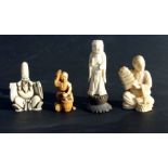 A Chinese carved ivory figure of a sage, 8cms high; together with three similar ivory figures (4).