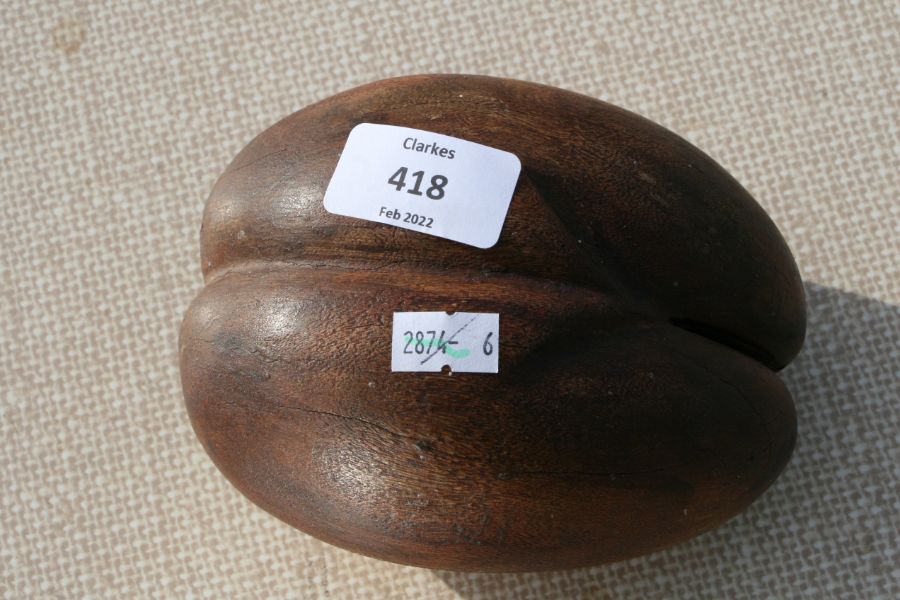 A treen carving in the form of a coco-de-mer, 20cms high.Condition ReportA couple of minor age - Image 3 of 7