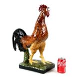 A large Bordallo Pinheiro Portuguese majolica figure of a cockerel. 54cm highCondition Reportgood