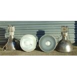 A set of four Thorlux metal industrial style pendant ceiling lights with glass shades, Cat. No.