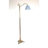 A Victorian style brass standard lamp.