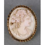 A 9ct gold mounted cameo brooch depicting a classical lady, 3.5cms high.