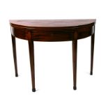 A 19th century mahogany Demi-lune tea table with boxwood string, the frieze with a single drawer and