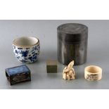 A Chinese Kuthing Swatow pewter tea caddy; together with a Chinese enamelled matchbox holder; a