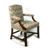 A George II style beechwood open armchair with upholstered seat and back.