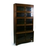 A Minty oak five-section stacking bookcase with leaded glass doors, 89cms wide.Condition ReportOne
