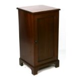 A mahogany pot cupboard, on bracket feet, 38cms wide.