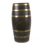 A brass bound oak rum barrel used as a stick stand, 70cms high.