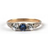 A 9ct gold Trilogy ring set with blue & white stones, approx UK size 'P', 2.1g.