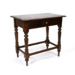 A mahogany side table with single frieze drawer, on turned legs, 76cms wide.