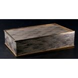 A modern design silver metal table topped cigar box, 31cms wide.