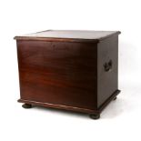 A mahogany box with brass carrying handles and sectioned interior, 45cms wide.