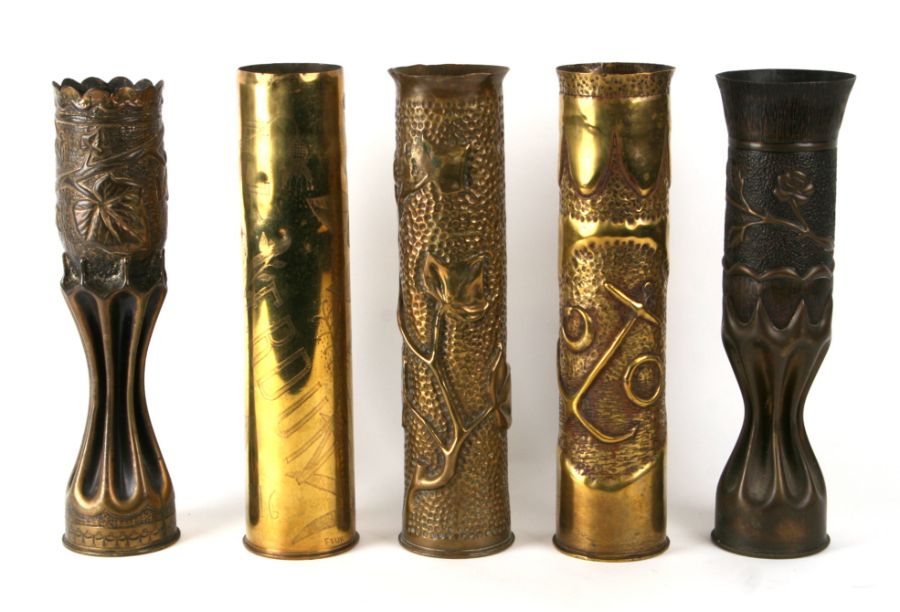 A quantity of WWI trench art to include an artillery shell modelled as a vase in the Art Nouveau