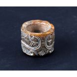 A Chinese hardstone archer's ring decorated with stylised fish and four character mark, 3.5cms