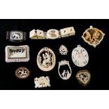 A group of early 20th century bone and ivorine jewellery to include pendants and bracelet.