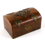 A Victorian walnut topped casket with brass decoration, 17cms wide.