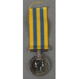 A Royal Navy officers Korea Medal named to CD. ENG. A.M. FORD. R.N.